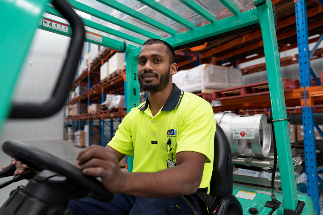 Closeup of man on forklift