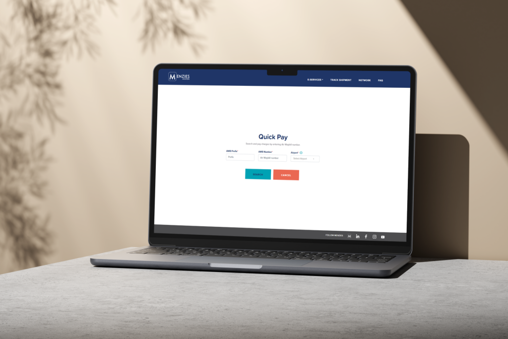 Menzies Aviation Quick Pay webpage displayed on a laptop screen.