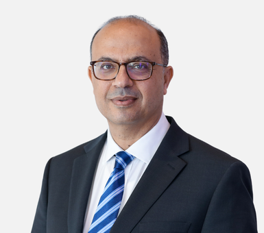 Professional headshot of Ehab Aziz, Chairman of Menzies Aviation